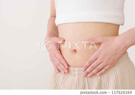 Slim and healthy female abdomen Slim and healthy female abdomen 117828169