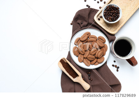 A cup of coffee with cookies on a white background 117829689