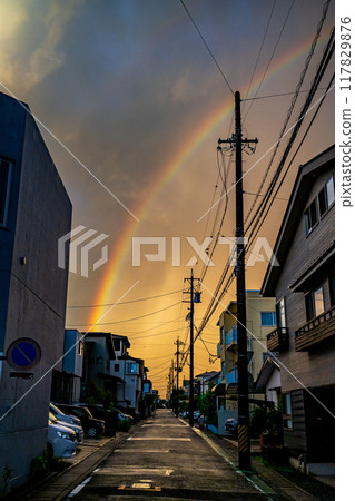 Rainbow over town 117829876