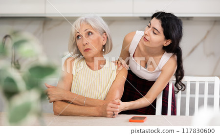 Adult daughter apologizes to her elderly mother after domestic quarrel Adult daughter apologizes to her elderly mother after domestic quarrel 117830600