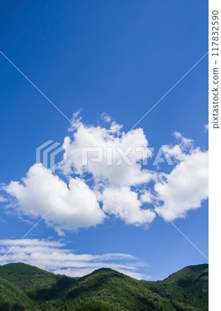 Summer mountains, blue sky and white clouds Summer mountains, blue sky and white clouds 117832590