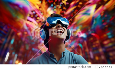 一名戴著 VR 護目鏡的男子對虛擬實境感到興奮 一名戴著 VR 護目鏡的男子對虛擬實境感到興奮 117833634