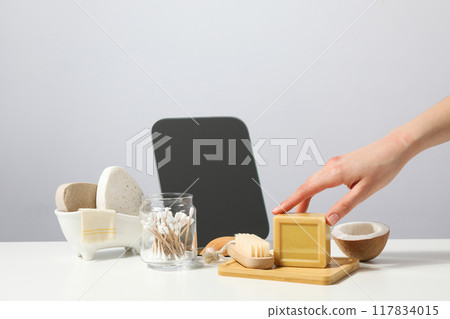 Natural handmade soap with ingredients, on a light background. Natural handmade soap with ingredients, on a light background. 117834015