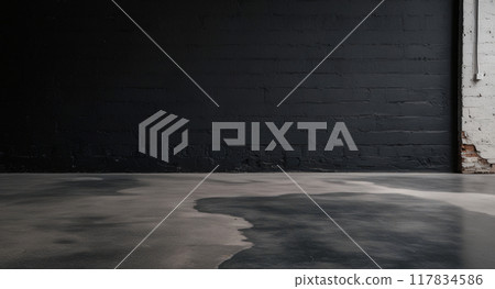 empty room with dark concrete wall and floor 117834586
