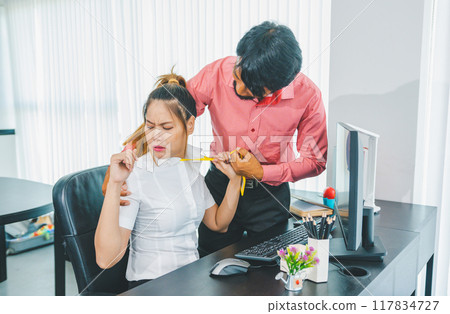 The boss or supervisor is harassing and hurting a female employee. Causing young employees to resist because they are uncomfortable and afraid of being sexually abused. Concept of sexual harassment in 117834727