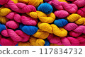 colorful balls of wool thread for background 117834732