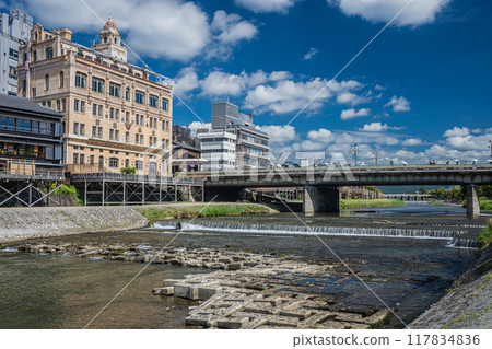 Summer scenery of Kamogawa River, Kyoto, near Shijo Ohashi Bridge Summer scenery of Kamogawa River, Kyoto, near Shijo Ohashi Bridge 117834836