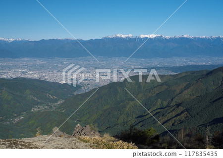 View of Matsumoto city and the Northern Alps from Ogahana in Utsukushigahara 117835435