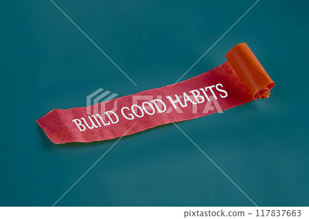 Business, psychological and build good habits concept. BUILD GOOD HABITS on an unfolded piece of paper Business, psychological and build good habits concept. BUILD GOOD HABITS on an unfolded piece of paper 117837663