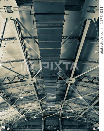 The framework of a large industrial warehouse The framework of a large industrial warehouse 117840314