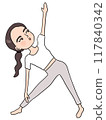 Woman doing yoga triangle pose 117840342