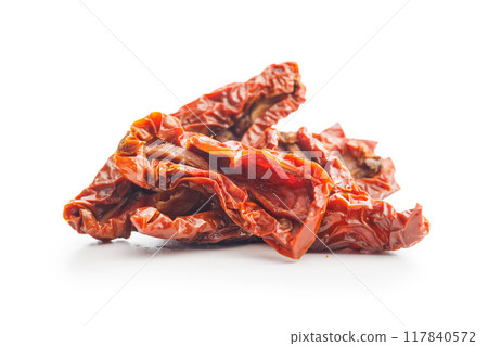 Sun dried red tomatoes isolated on white background. 117840572