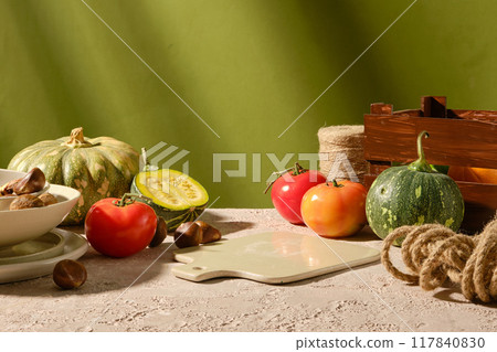 The photo of vegetable in fall season concept, was taken from front view on green background with many sunshine. Blank tray for culinary products displaying in center, copy space The photo of vegetable in fall season concept, was taken from front view on green background with many sunshine. Blank tray for culinary products displaying in center, copy space 117840830