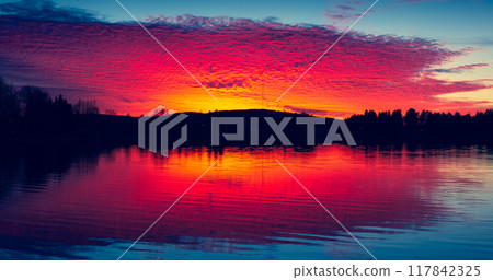 Summer night sunset from Sotkamo, Finland. 117842325
