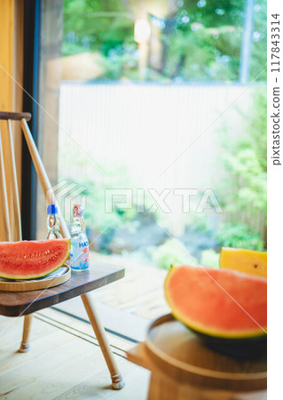 Eating watermelon on the porch Eating watermelon on the porch 117843314