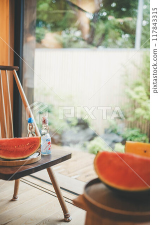 Eating watermelon on the porch Eating watermelon on the porch 117843315