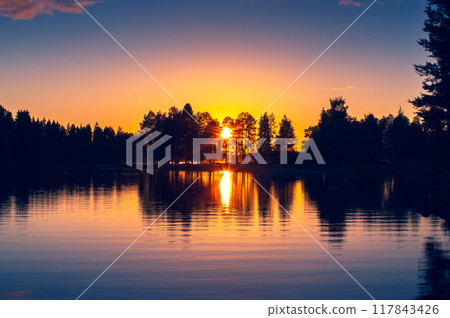 Summer night sunset from Sotkamo, Finland. 117843426