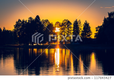 Summer night sunset from Sotkamo, Finland. 117843427