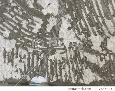 Fragment of an old wall with cracks and holes. Structure of an old wal 117843893