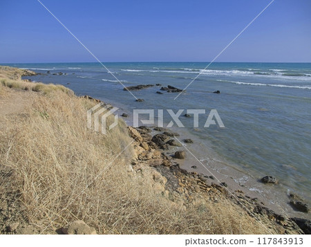 The coast of southern Sicily, in daylight 117843913
