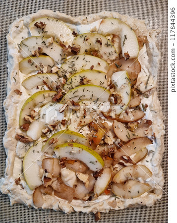 Unbaked savory tart 117844396
