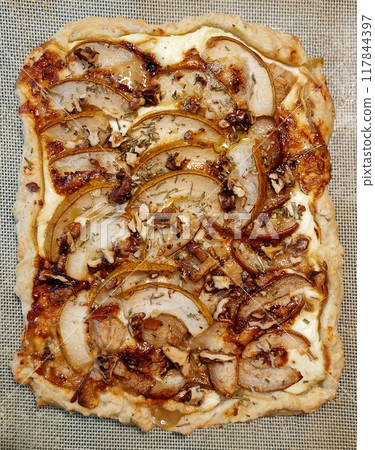 Baked savory tart 117844397