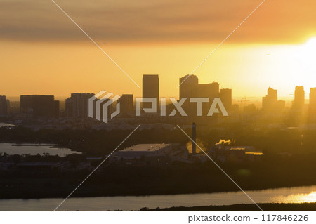 Urban sunset landscape of downtown district of Tampa city in Florida, USA. Dramatic skyline with high skyscraper buildings in modern american megapolis 117846226