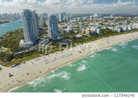 View from above of american southern seashore of Miami Beach city. South Beach high luxurious hotels and apartment buildings. Tourist infrastructure in southern Florida, USA 117846240
