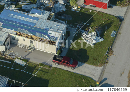 View from abover of damaged mobile homes after hurricane Ian in Florida residential area. Consequences of natural disaster View from abover of damaged mobile homes after hurricane Ian in Florida residential area. Consequences of natural disaster 117846269