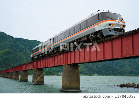 KTR8500 diesel car crossing the Yura River Bridge in Kyoto KTR8500 diesel car crossing the Yura River Bridge in Kyoto 117846352
