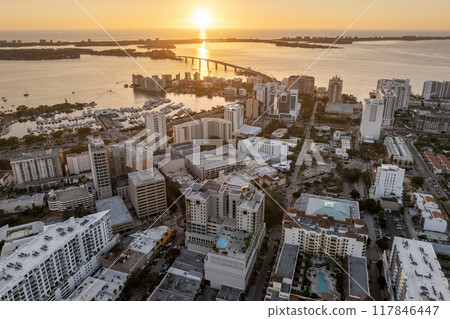 Sarasota, Florida city downtown at sunset with expensive waterfront high-rise buildings. Urban travel destination in the USA 117846447