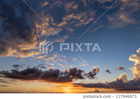 Evening sunset sky with colorful clouds. Panoramic skyscape Evening sunset sky with colorful clouds. Panoramic skyscape 117846873