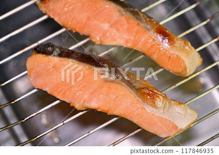 Note: The steam is synthetic. Grilled coho salmon, grilled fish, coho salmon, coho salmon, salmon, cooking scene, grill cooking. Note: The steam is synthetic. Grilled coho salmon, grilled fish, coho salmon, coho salmon, salmon, cooking scene, grill cooking. 117846935