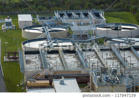 Aerial view of water treatment factory at city wastewater cleaning facility. Purification process of removing undesirable chemicals, suspended solids and gases from contaminated liquid 117847139