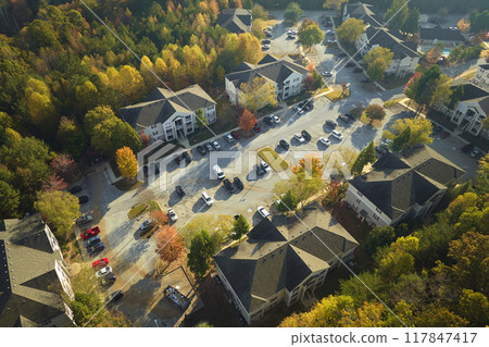 Aerial view of american apartment buildings in South Carolina residential area. New family condos as example of real estate development in USA suburbs 117847417