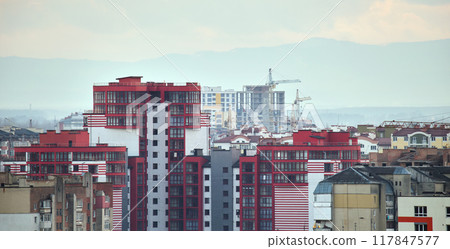 High rise residential apartment building in city residential area. Real estate development 117847577