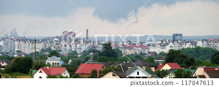 Landscape of dark clouds forming on stormy sky during thunderstorm over city rural area. Landscape of dark clouds forming on stormy sky during thunderstorm over city rural area. 117847613