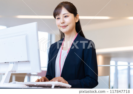 Businesswomen working in an office. Photo courtesy of Denpa Gakuen, Tokyo Electronics College. Businesswomen working in an office. Photo courtesy of Denpa Gakuen, Tokyo Electronics College. 117847718