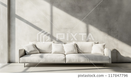 White interior with sofa and concrete wall 117847796