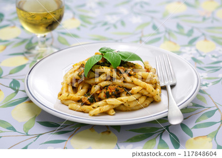 Bucchiate alla Trapanese. A specialty pasta from Trapani, Sicily. Italian cuisine. Bucchiate alla Trapanese. A specialty pasta from Trapani, Sicily. Italian cuisine. 117848604