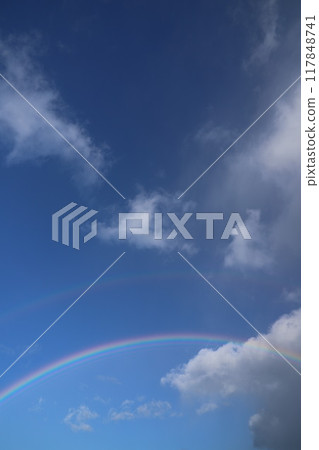Rainbow and clouds in the blue sky after the rain #rainbow 117848741
