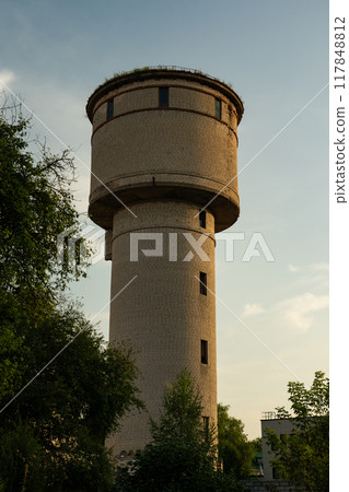 A brick, old tower in the city of Baranovichi. The old water tower 117848812