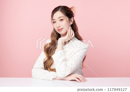 Beautiful young asian woman with clean fresh skin on pink background, Face care, Facial treatment, Cosmetology, beauty and spa, Asian women portrait. 117849127