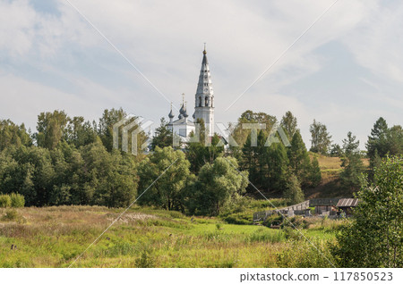 Country landscape, ancient church in the distance Country landscape, ancient church in the distance 117850523