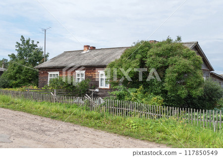 Old country wooden house in the village Old country wooden house in the village 117850549