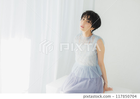 Beauty image of a woman with short hair Beauty image of a woman with short hair 117850704