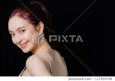 Woman with a ponytail Woman with a ponytail 117850796