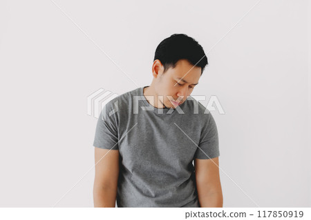 Sad man admit and confess his failure isolated on white. 117850919