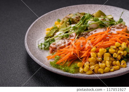 Fresh juicy salad with meat, mozzarella, carrots, lettuce, corn 117851927