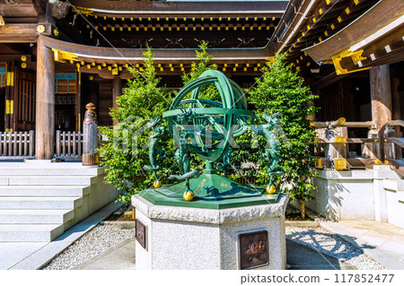 Samukawa cityscape in Japan. Samukawa Shrine, Ichinomiya of Sagami Province. Compass and armillary sphere...the main hall is in the back = July 21, 2024 117852477